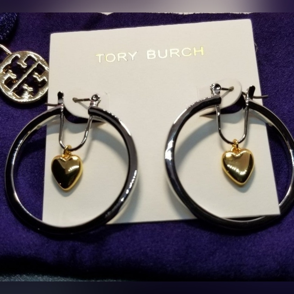 Silver and gold hoops by Tory Burch
